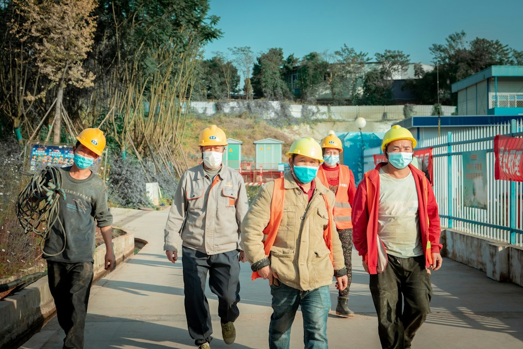 Team of construction workers on site demonstrating safety and expertise